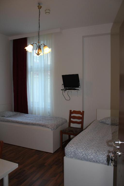 Arnes Hotel Viena Quarto foto